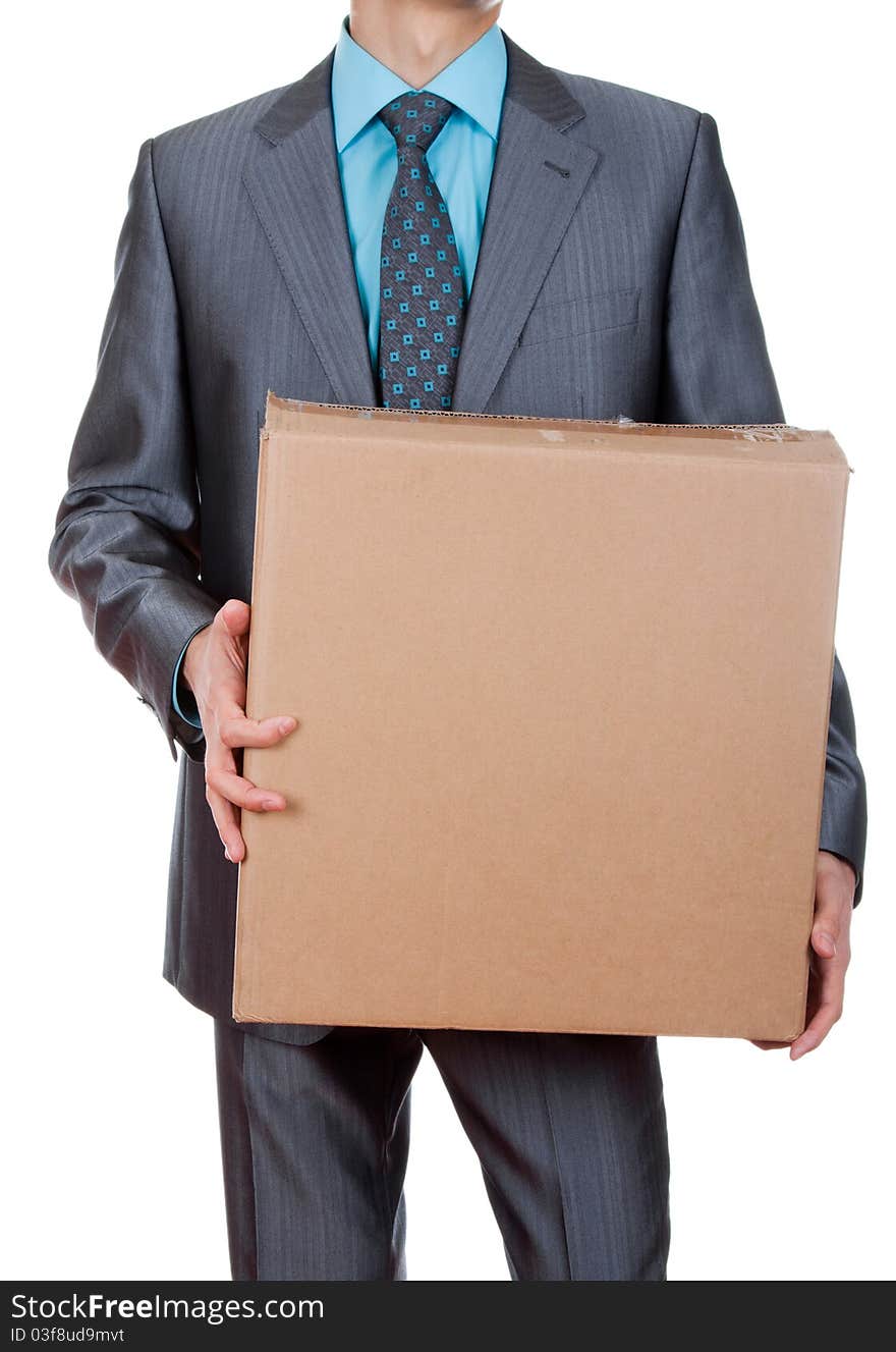 An isolated shot of a businessman carrying a paper box, business moving concept. An isolated shot of a businessman carrying a paper box, business moving concept