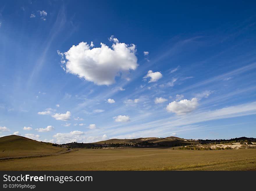 Meadow meets sky in Bashang