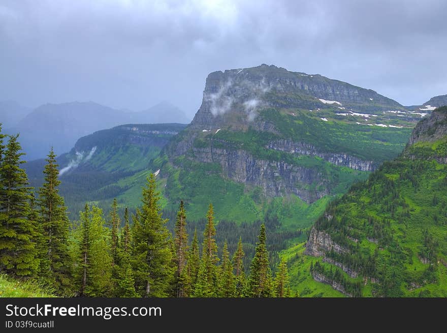 HDR of misty mountain scene in Glacier National Park, Montana, USA