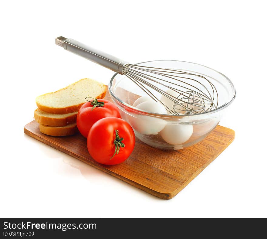 Eggs with tomatoes and bread