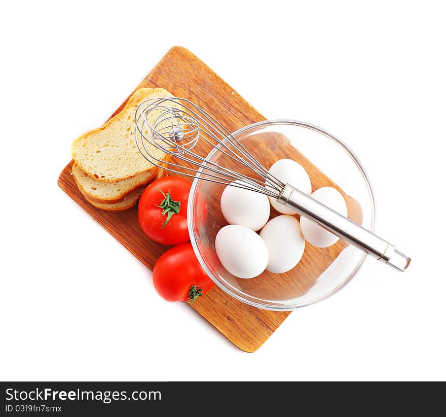 Eggs with tomatoes and bread