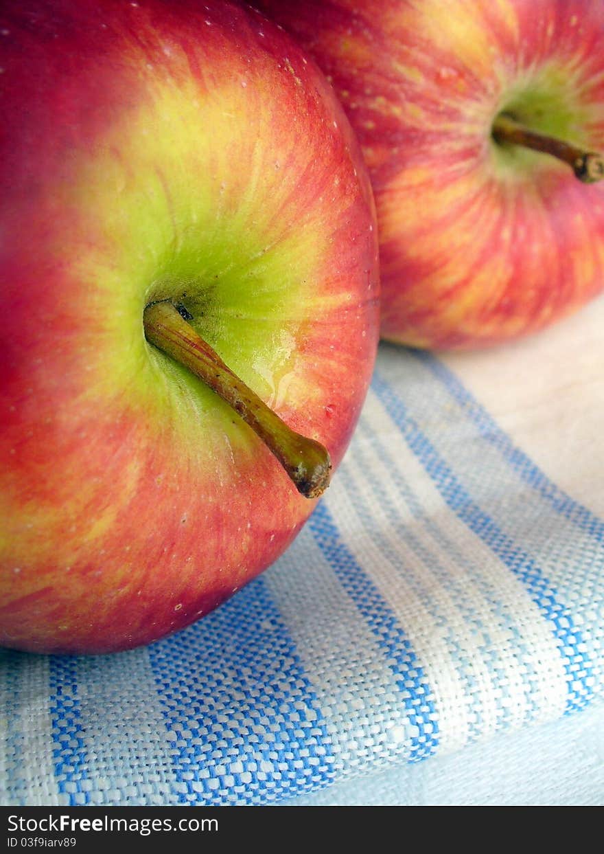 Closeup two red apples on a white background