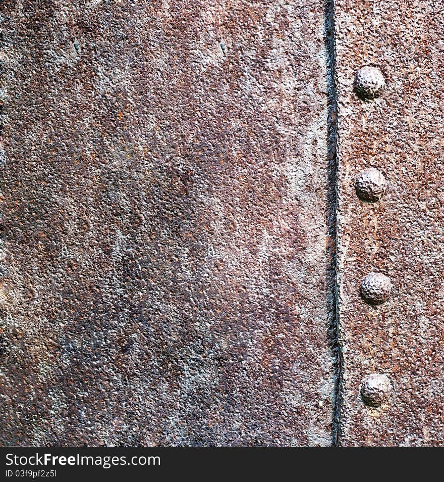 A metal texture and rivet