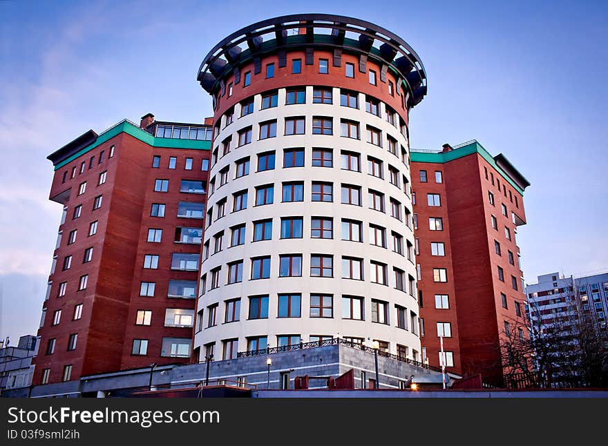 Multi-storey apartment building at evening