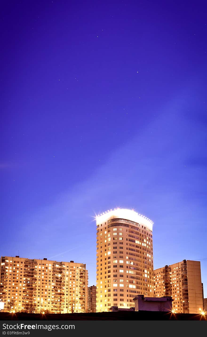 Multi-storey apartment block at night