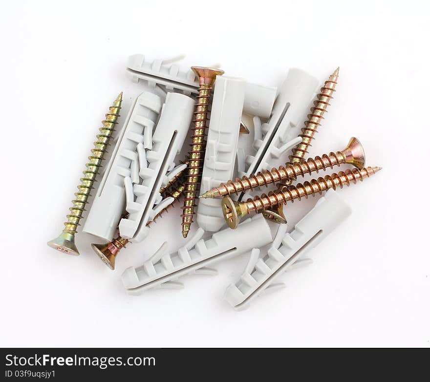 Dowels and screws on a white background