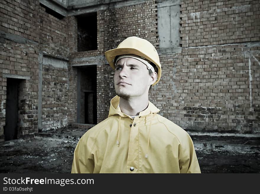 Portrait of confident construction worker with helmet