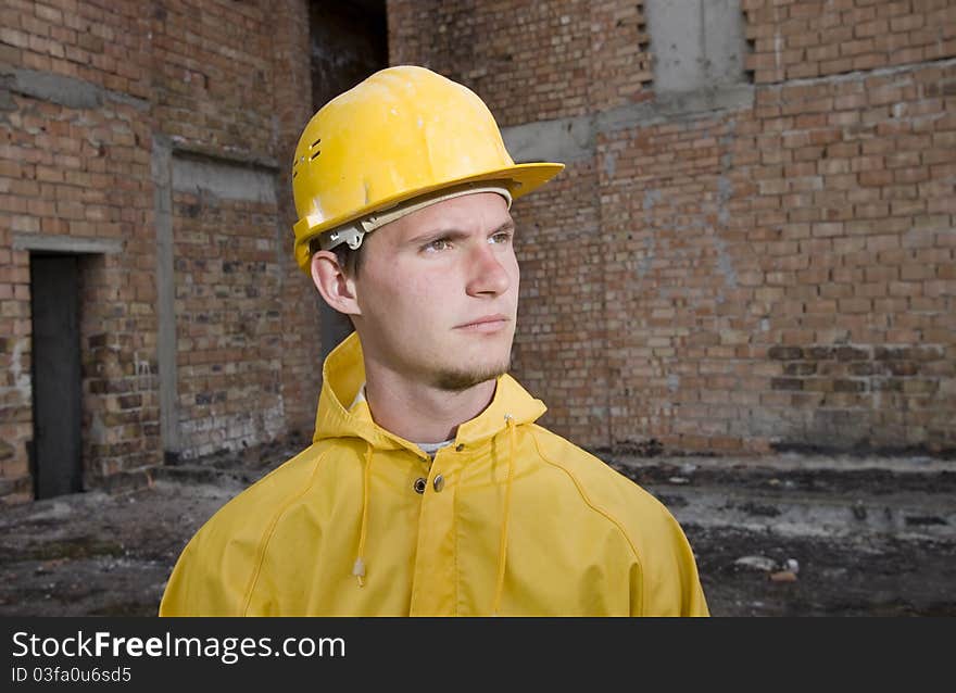 Portrait of confident construction worker with helmet