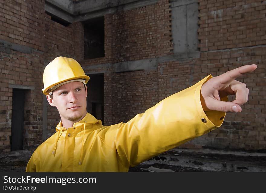 Portrait of confident construction worker with helmet