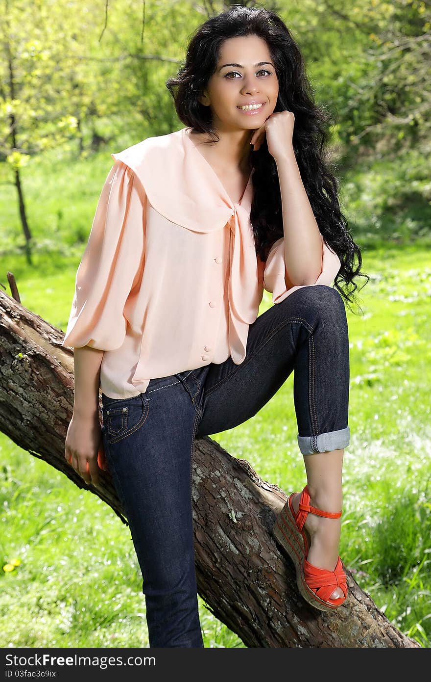 Thoughtful brunette in the park