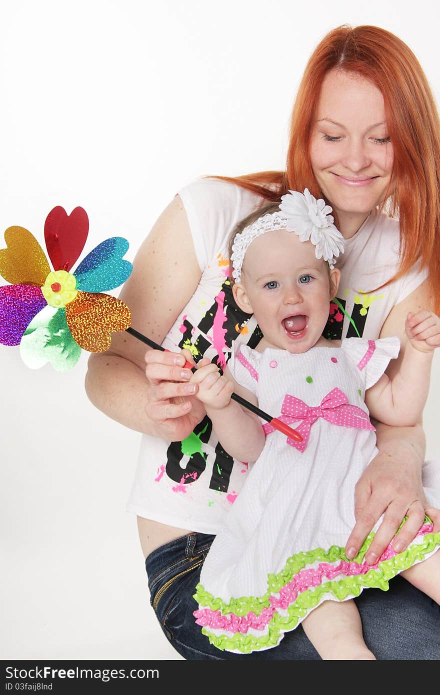 Mother And Daughter With Flower