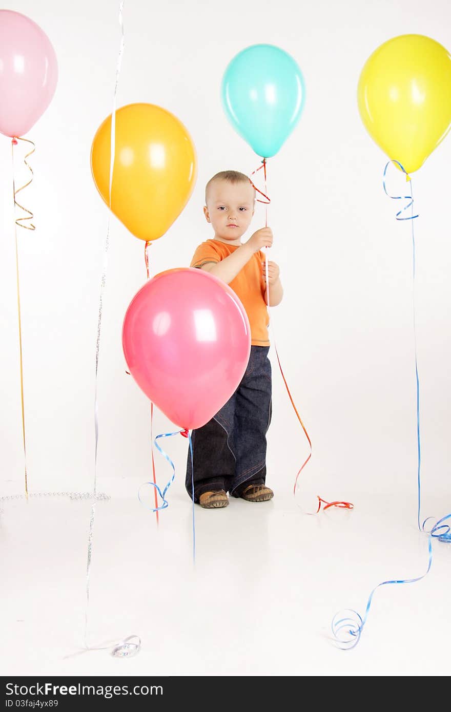 Young boy with balloons