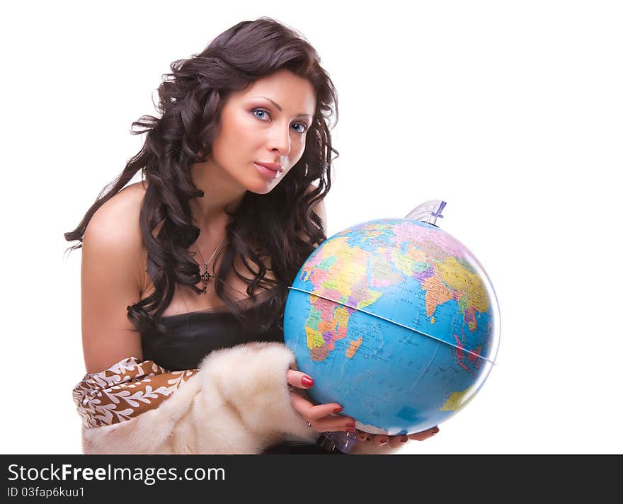 Beautiful woman with a globe isolated over a white background