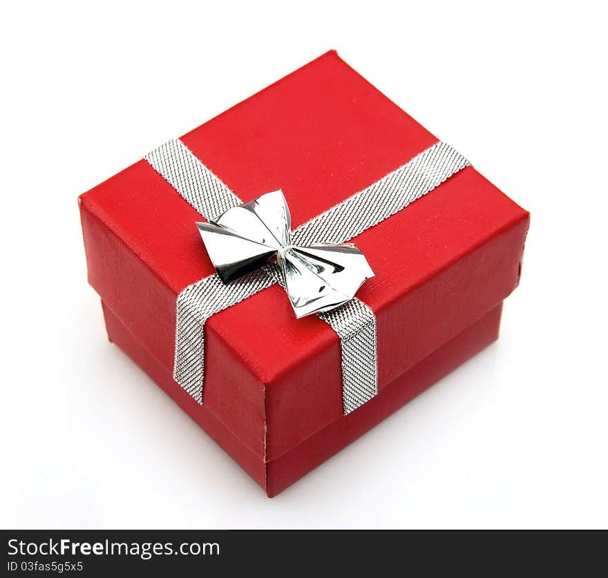 Red gift box with silver ribbon