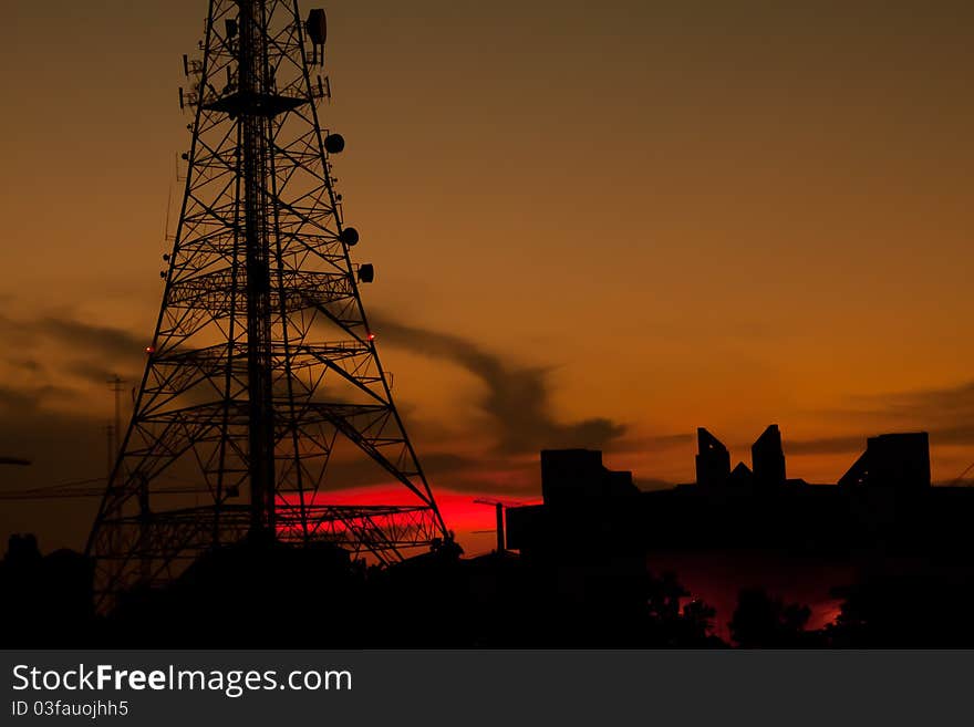 Antenna with a sunset backdrop.