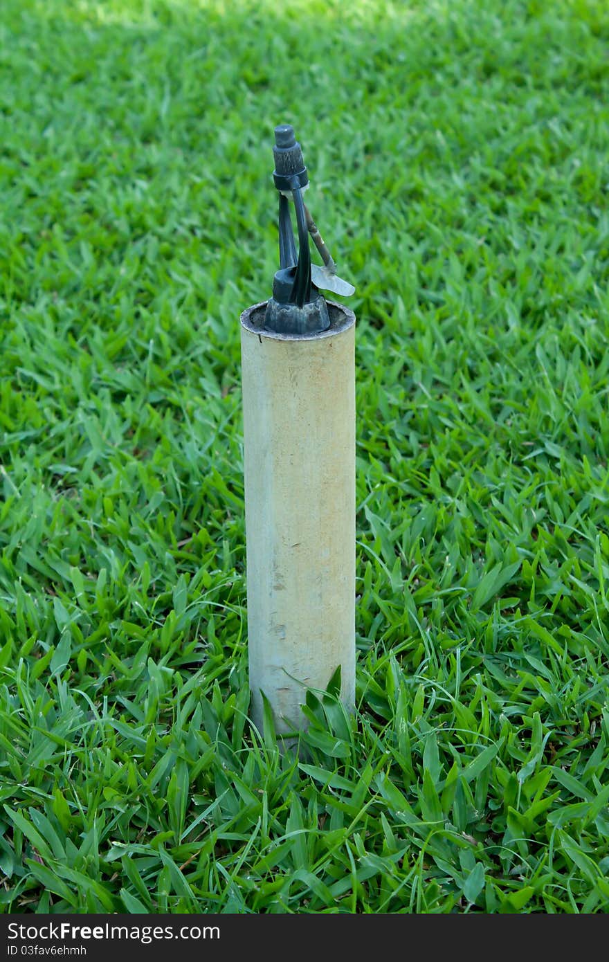 Green garden lawn water sprinkler.