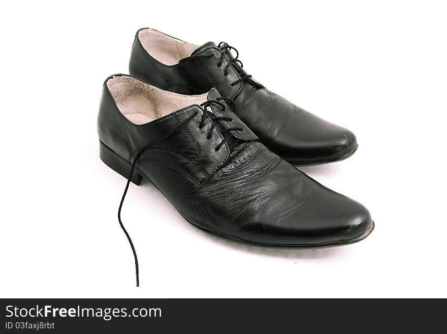 The image of man's leather shoes under the white background