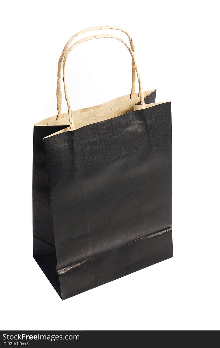 Black paper shopping bag isolated