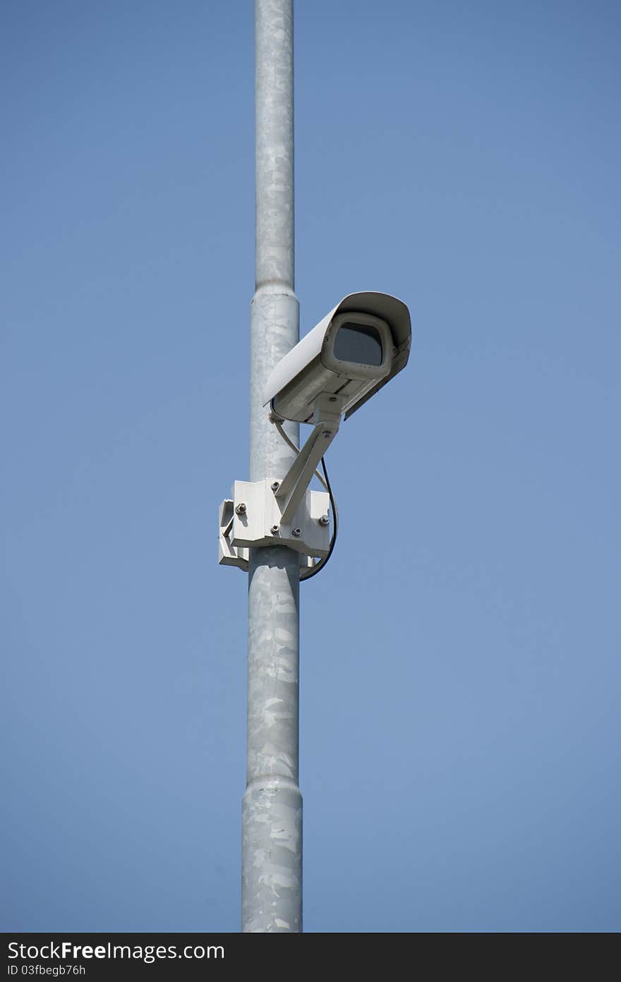 Surveillance camera on a pole. Surveillance camera on a pole