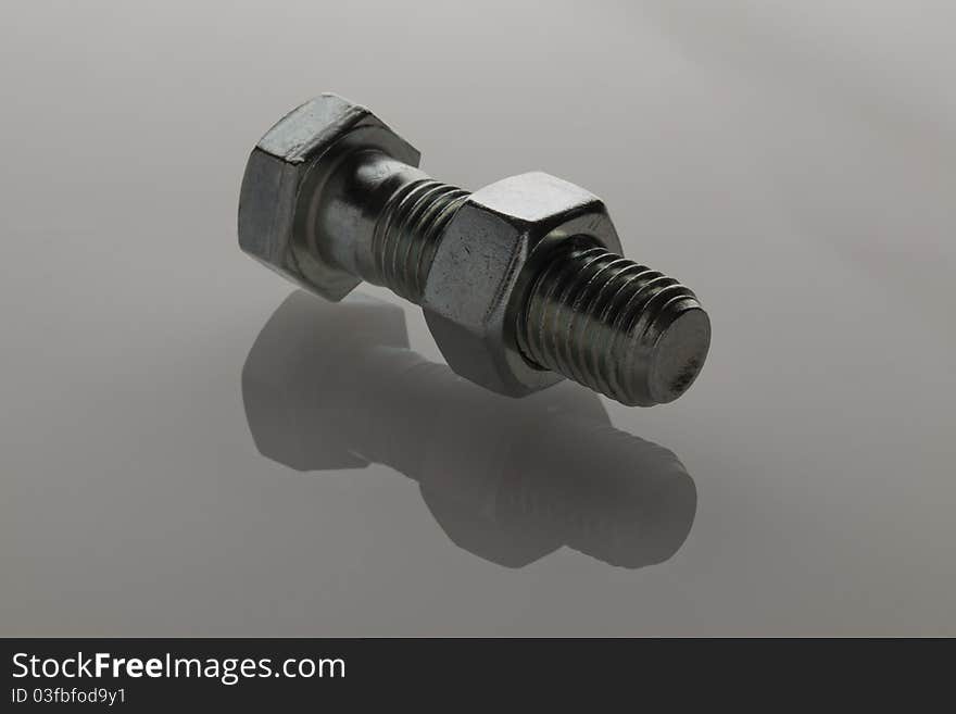 Screw with bolt and reflection