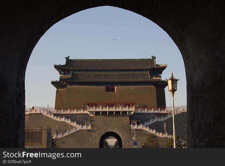 Qianmen (Front Gate) is the colloquial name for Zhengyangmen (meaning gate of the zenith Sun), a gate in Beijing's historic city wall. The gate is situated to the south of Tiananmen Square and once guarded the southern entry into the Inner City. Although much of Beijing's city walls were demolished, Qianmen remains an important geographical marker of the city. The city's central north-south axis passes through Zhengyangmen's main gate. photo take on: Apr 27, 2011. Qianmen (Front Gate) is the colloquial name for Zhengyangmen (meaning gate of the zenith Sun), a gate in Beijing's historic city wall. The gate is situated to the south of Tiananmen Square and once guarded the southern entry into the Inner City. Although much of Beijing's city walls were demolished, Qianmen remains an important geographical marker of the city. The city's central north-south axis passes through Zhengyangmen's main gate. photo take on: Apr 27, 2011