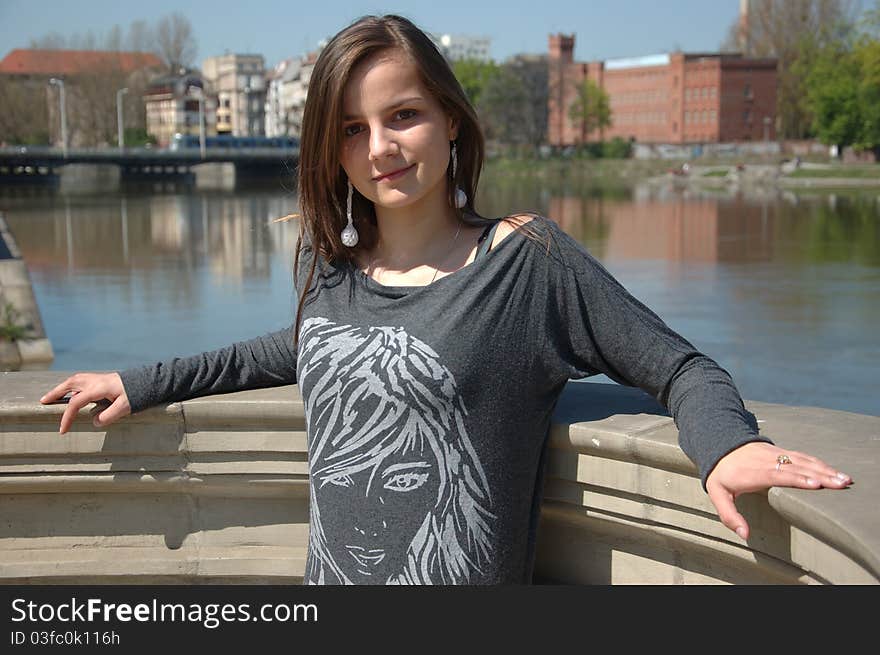 Sweet, young girl portrait. Teenage model in Poland wearing casual dress, smiling gently. Sweet, young girl portrait. Teenage model in Poland wearing casual dress, smiling gently.