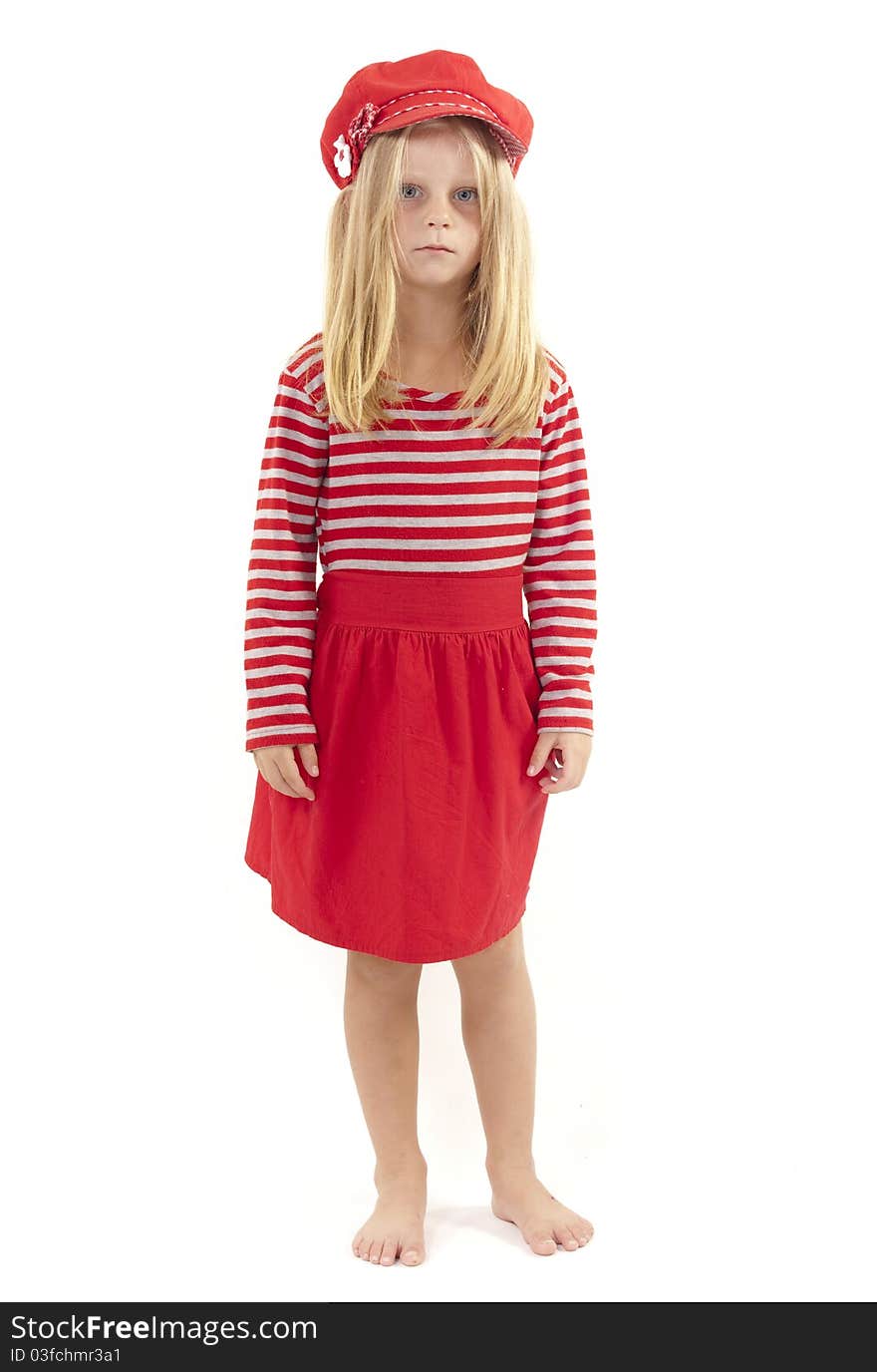 Little girl in red hat and dress looking confused and unhappy. On white background. Little girl in red hat and dress looking confused and unhappy. On white background.