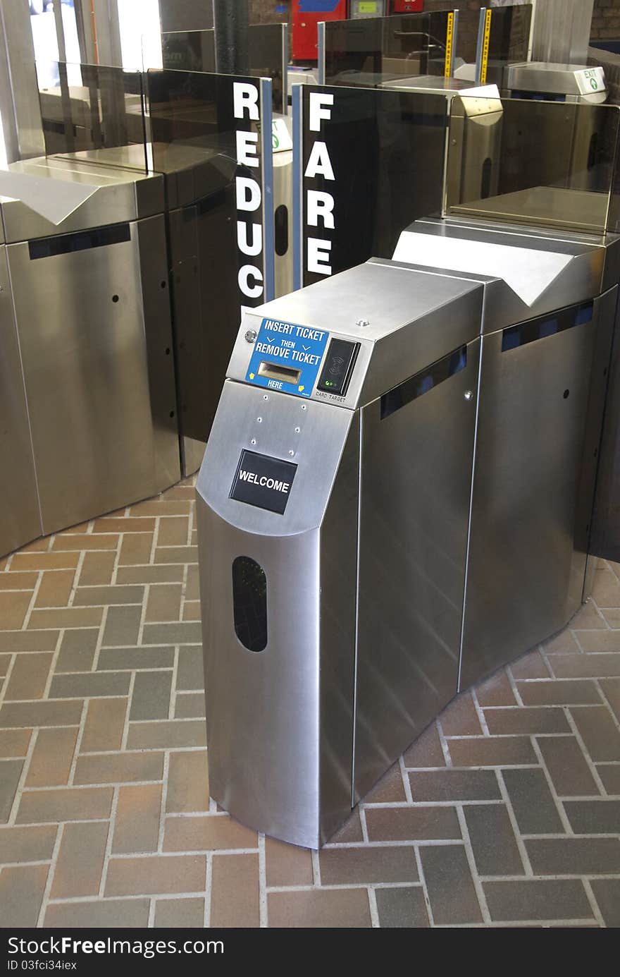 Modern subway ticket turnstile in stainless steel