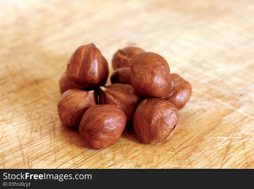 Hazelnuts On Wooden Background