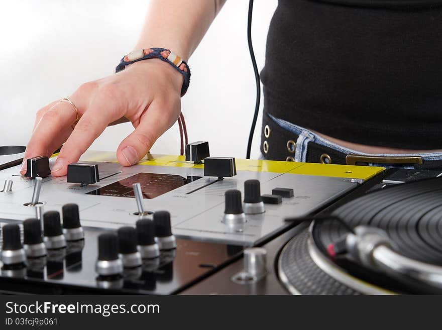 Hands Of Female DJ On Mixing Controller