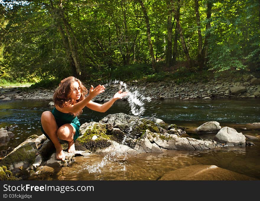 Young  Woman Playing With Water