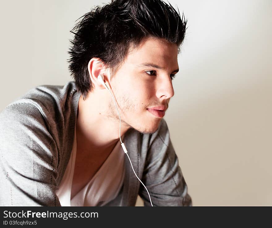 Young man playing a guitar. Young man playing a guitar