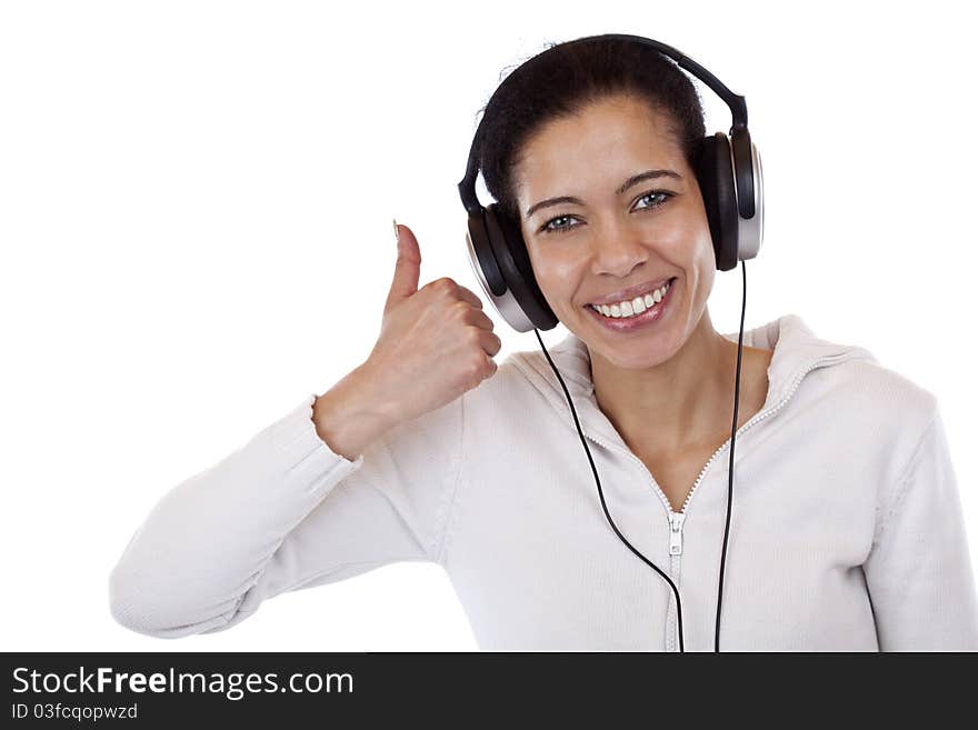 Attractive, smiling black woman with headset shows thumb up. Isolated on white background. Attractive, smiling black woman with headset shows thumb up. Isolated on white background.