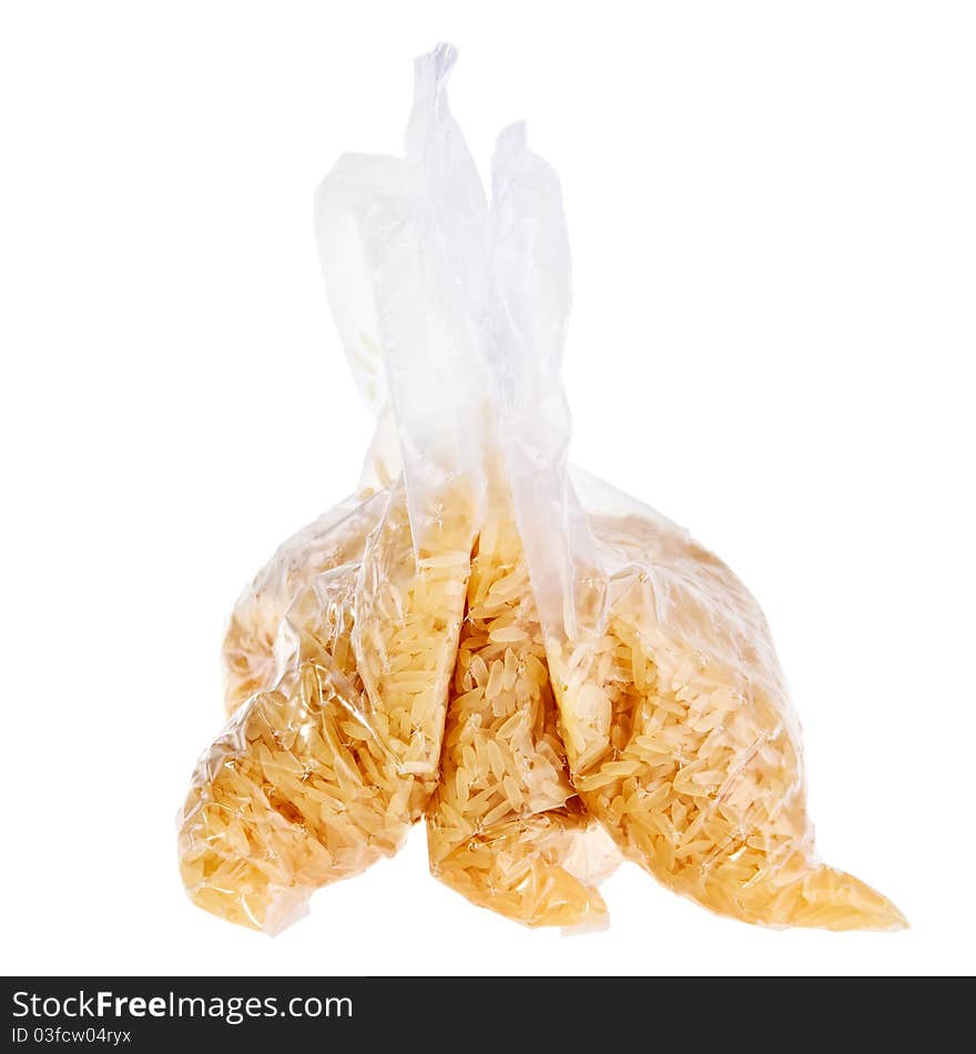 Rice ready to boil in plastic bags isolated over white background. Rice ready to boil in plastic bags isolated over white background.