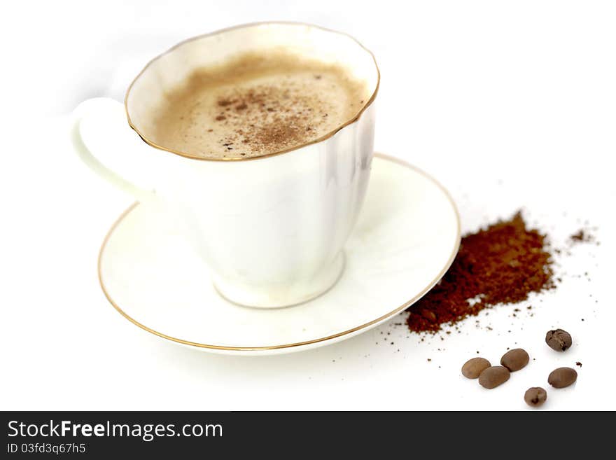 Macro shot coffee beans and coffe cup. Macro shot coffee beans and coffe cup