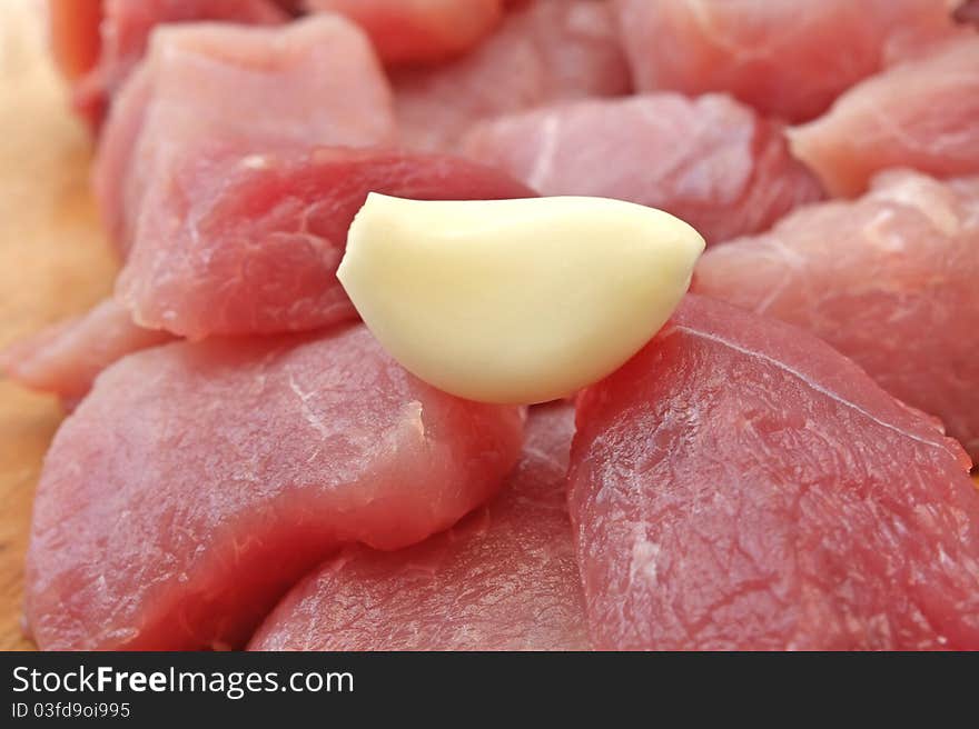 Raw meat with garlic