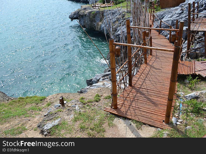 Wooden bamboo bridge over the rock. Wooden bamboo bridge over the rock