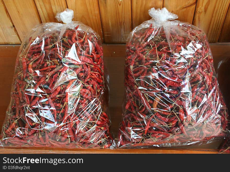 Two bags of red hot Thai chilis