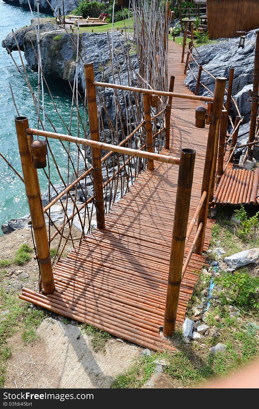 Wooden bamboo bridge over the rock. Wooden bamboo bridge over the rock