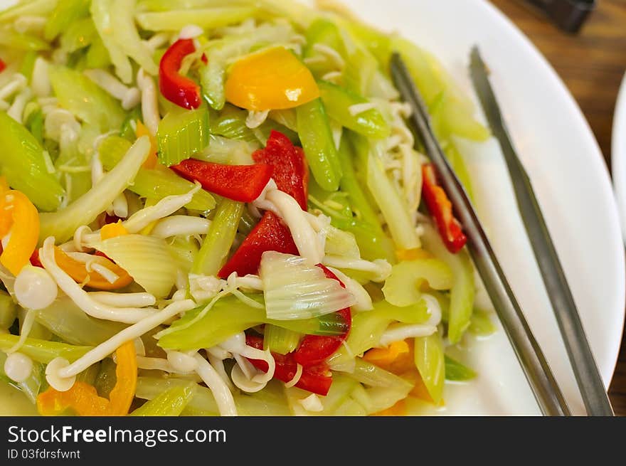 Green vegetables with golden mushroom