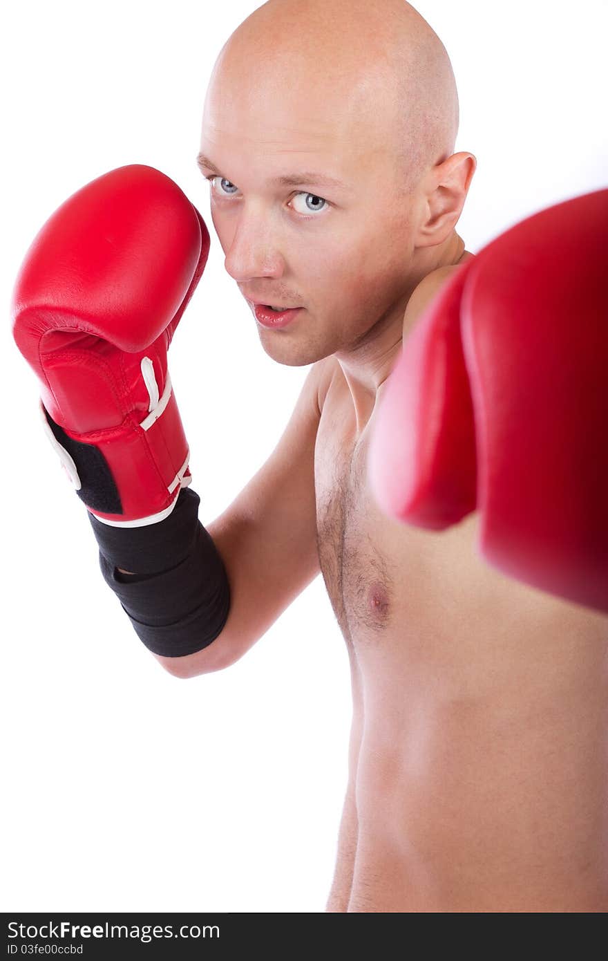 Young boxer wearing red gloves. Young boxer wearing red gloves