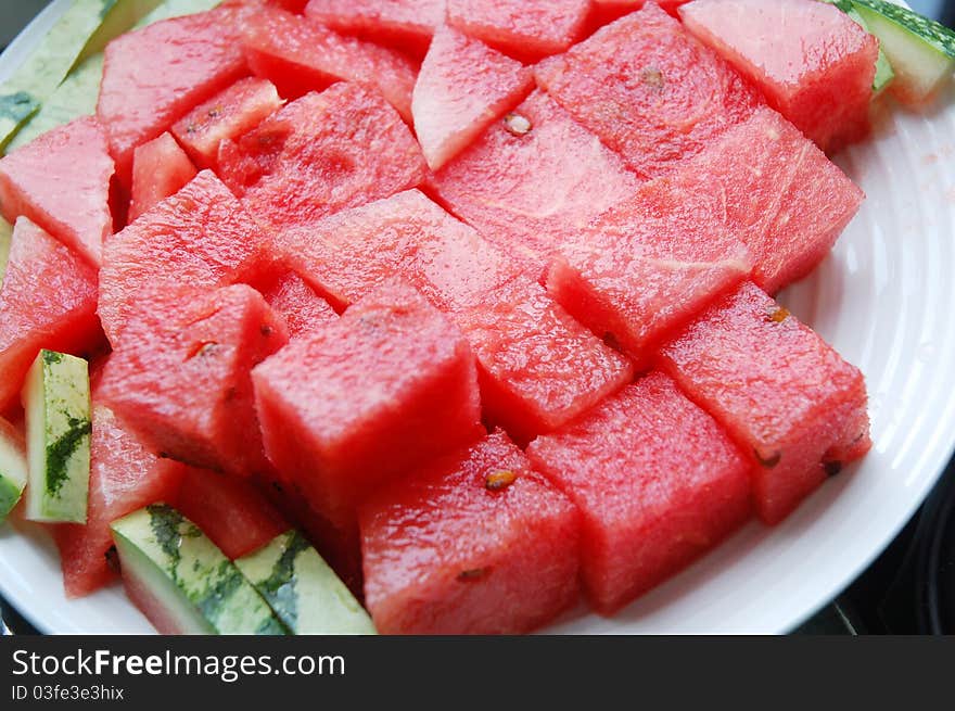 Appetizing slices of watermelon isolated on plate