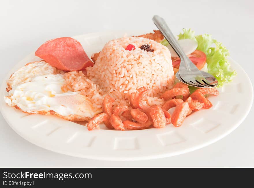 Fried rice mix with egg ham hotdog and vegetable