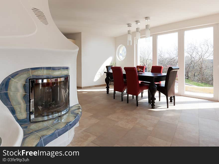 Interior with chimney, bright room and modern architecture