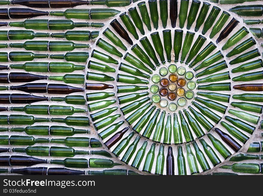 Wall made of green glass bottle with artificial. Wall made of green glass bottle with artificial