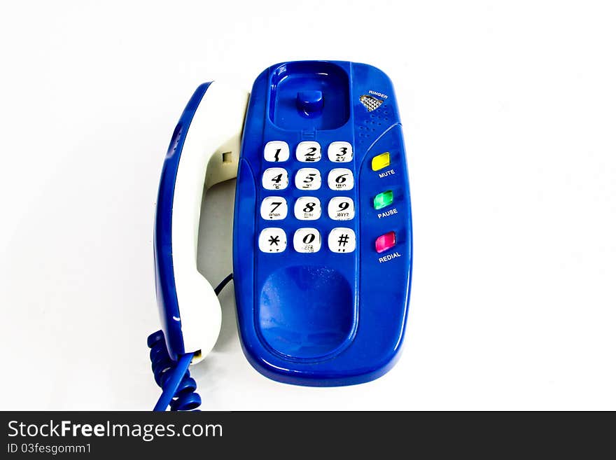 Isolated blue telephone with its buttons. Isolated blue telephone with its buttons