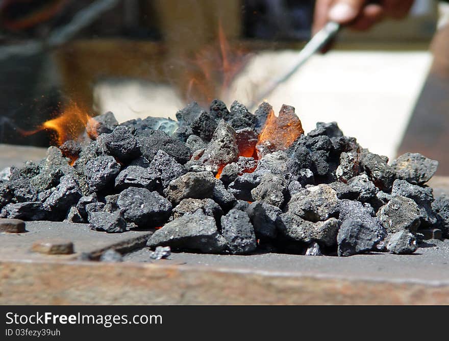 Furnace with hot flaming coal. Close-up shot. Furnace with hot flaming coal. Close-up shot.