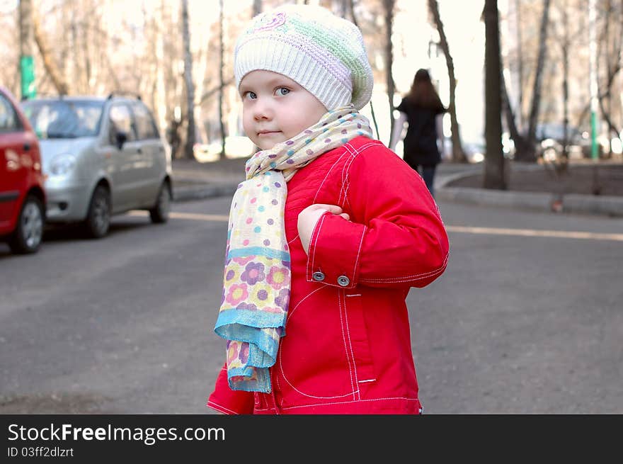 Pretty little girl on the street.