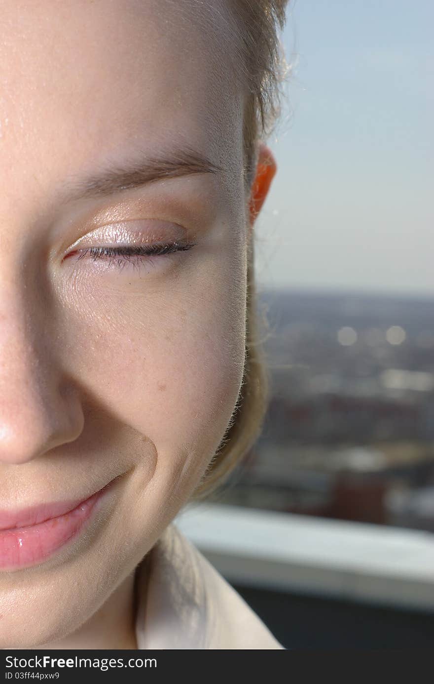 Half female face in day