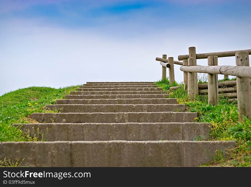 Wooden staircase and banister in the park. Wooden staircase and banister in the park